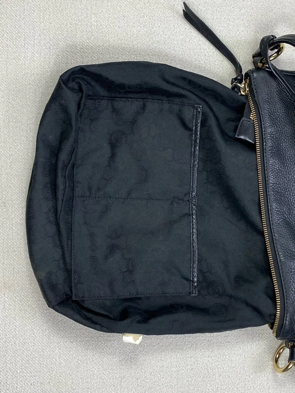 Michael Kors Black Grain Leather Hobo with Gold MK Charm